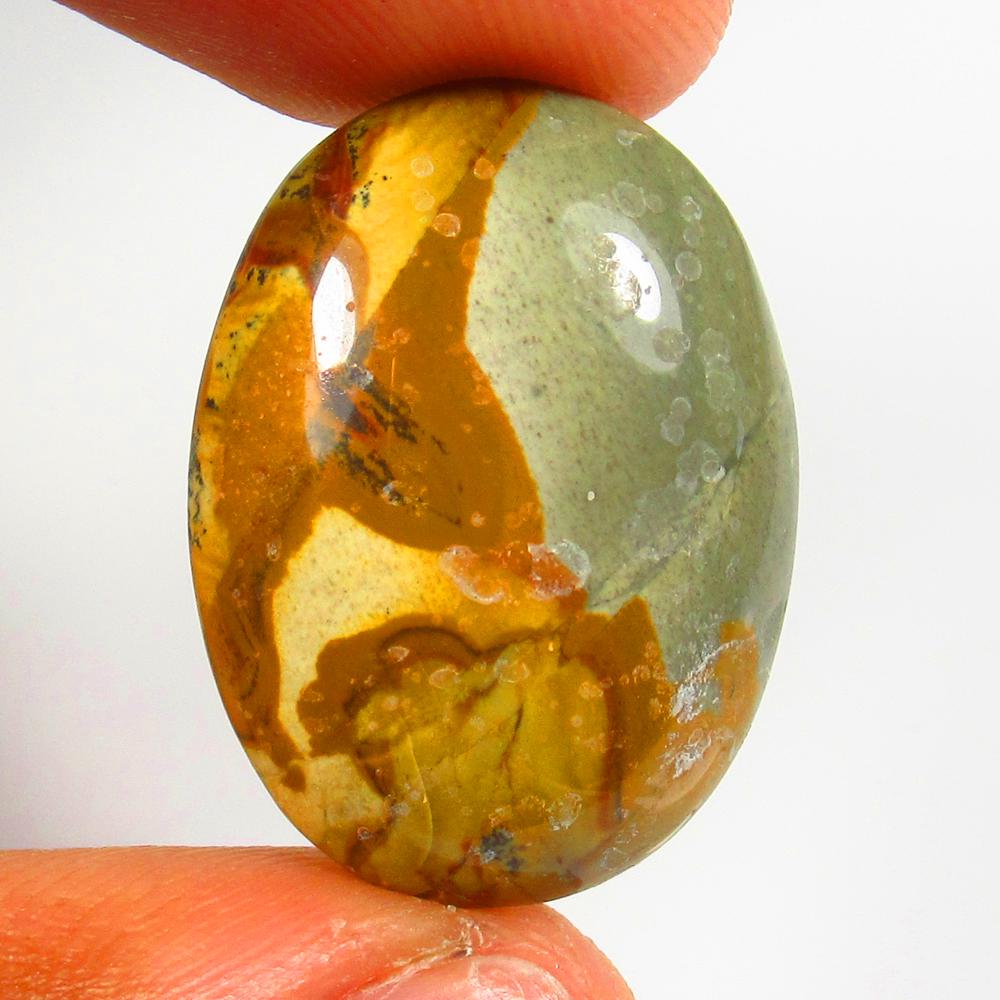 Natural Jasper Quartz - 21.26 Ct: No Reserve! Title: Natural Jasper Quartz - 21.26 Ct Origin: Brazil Weight: 21.26 Size/Dimensions: 26.0 x 18.5 x 6.3 mm Additional Information: Pieces : 1 No's / Shape : Oval Cabochon / Color : Yellow