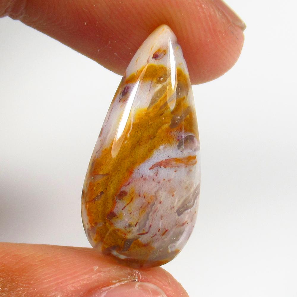 Natural Jasper Quartz - 10.15 Ct: No Reserve! Title: Natural Jasper Quartz - 10.15 Ct Origin: Brazil Weight: 10.15 Size/Dimensions: 24.0 x 12.0 x 5.0 mm Additional Information: Pieces : 1 No's / Shape : Pear Cabochon / Color : Orange
