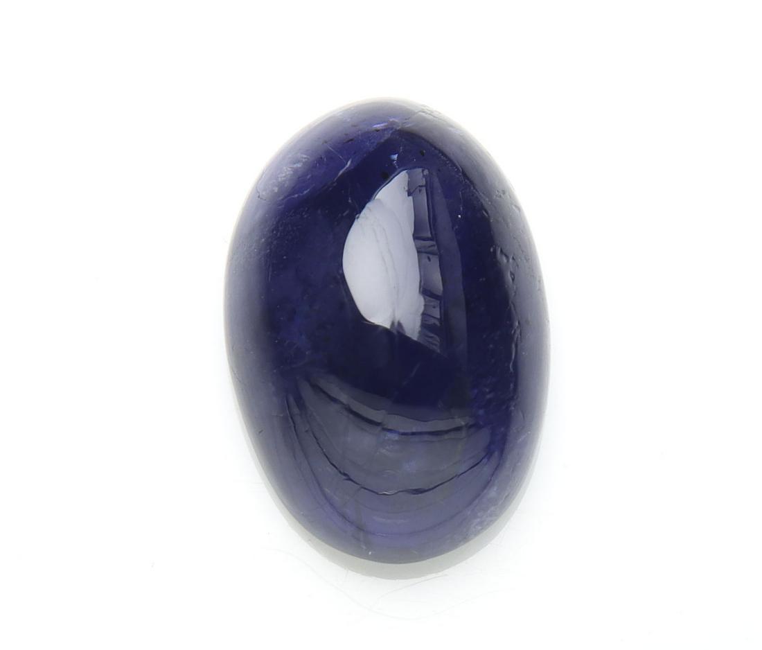 4.13 cts Natural Iolite: No Reserve! Title: 4.13 cts Natural Iolite Additional Information: Gemstone : Natural Iolite Shape and cut : Oval Cabochon Weight : 4.13 carats Measurements : 13.41x9.12x5.06 mm , Color : Violet Trans