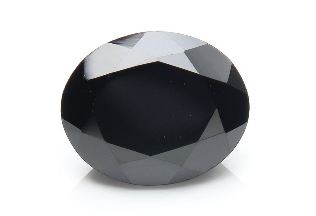 4.61 Cts Natural Black Spinel: No Reserve! Title: 4.61 Cts Natural Black Spinel Additional Information: Gemstone : Natural Black Spinel Shape and cut : Oval Cut Origin : Africa Weight : 4.61 carats Measurements : 11x9 mm Color : Bl