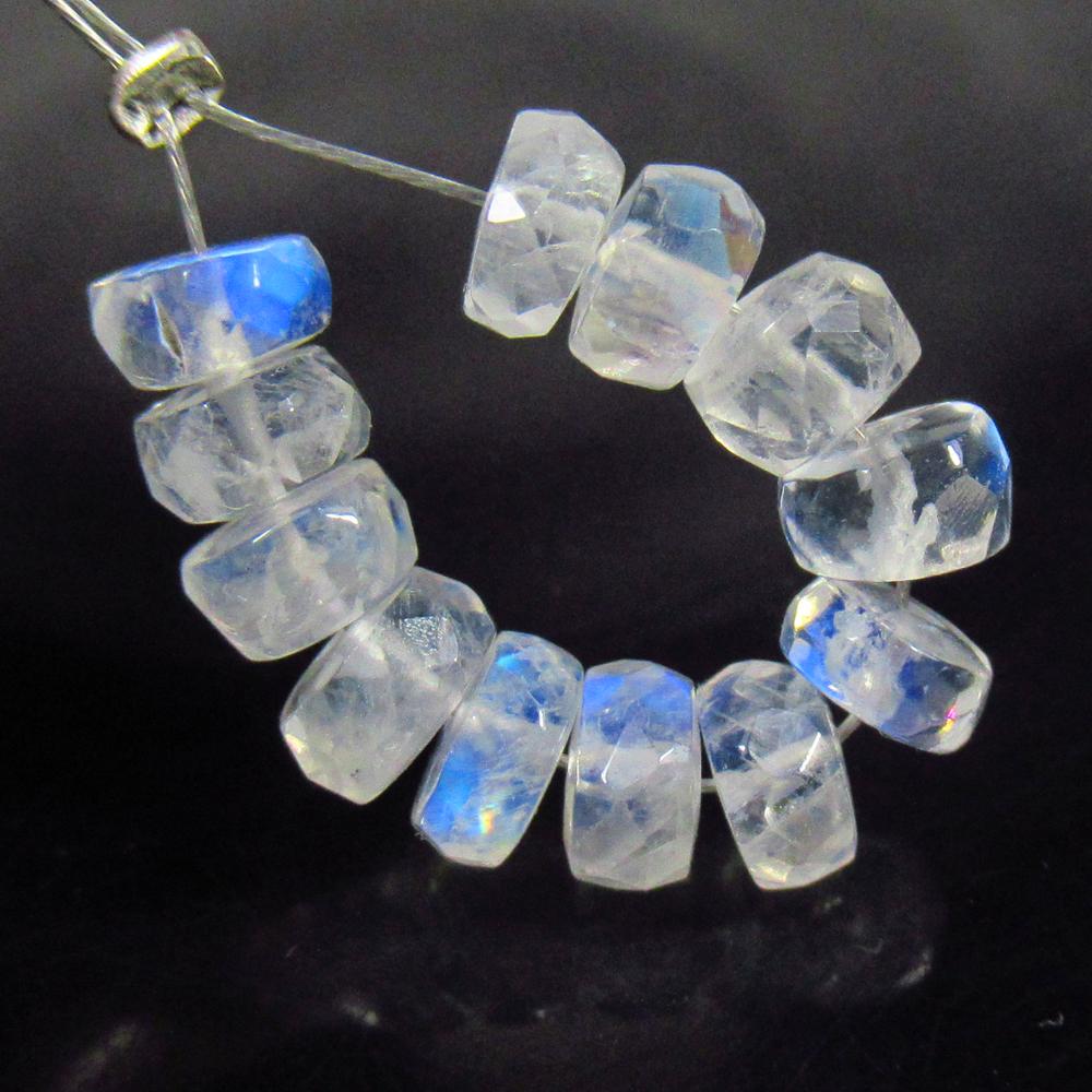 8.11 Ct Natural 11 Drilled Blue Moonstone Round Beads: No Reserve! Title: 8.11 Ct Natural 11 Drilled Blue Moonstone Round Beads Stone Clarity: Semi-Transparent Gemstones: Natural Moonstone Beads Carat Weights: 8.11 Size/Dimensions: 4.80 - 5.10 mm / 11 PC'