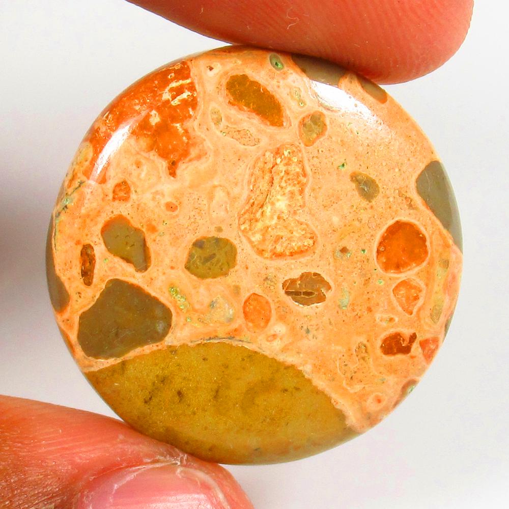 Natural Jasper Quartz - 31.58 Ct: No Reserve! Title: Natural Jasper Quartz - 31.58 Ct Origin: Brazil Weight: 31.58 Size/Dimensions: 27.0 x 27.0 x 5.3 mm Additional Information: Pieces : 1 No's / Shape : Round Cabochon / Color : Orange