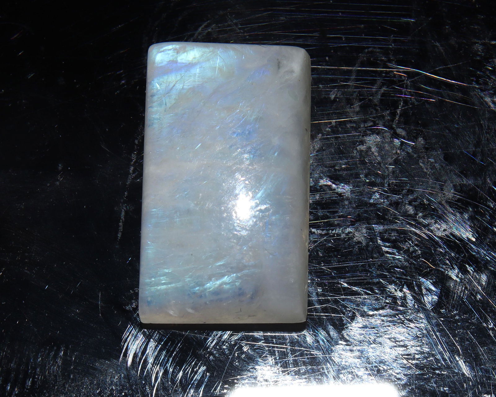 10.89 Cts Natural Rainbow Moonstone: No Reserve! Title: 10.89 Cts Natural Rainbow Moonstone Additional Information: Gemstone : Natural Rainbow Moonstone Shape : Rectengular Cabochon Weight : 10.89 carats Measurements : 17.87x10.50x5.45 m