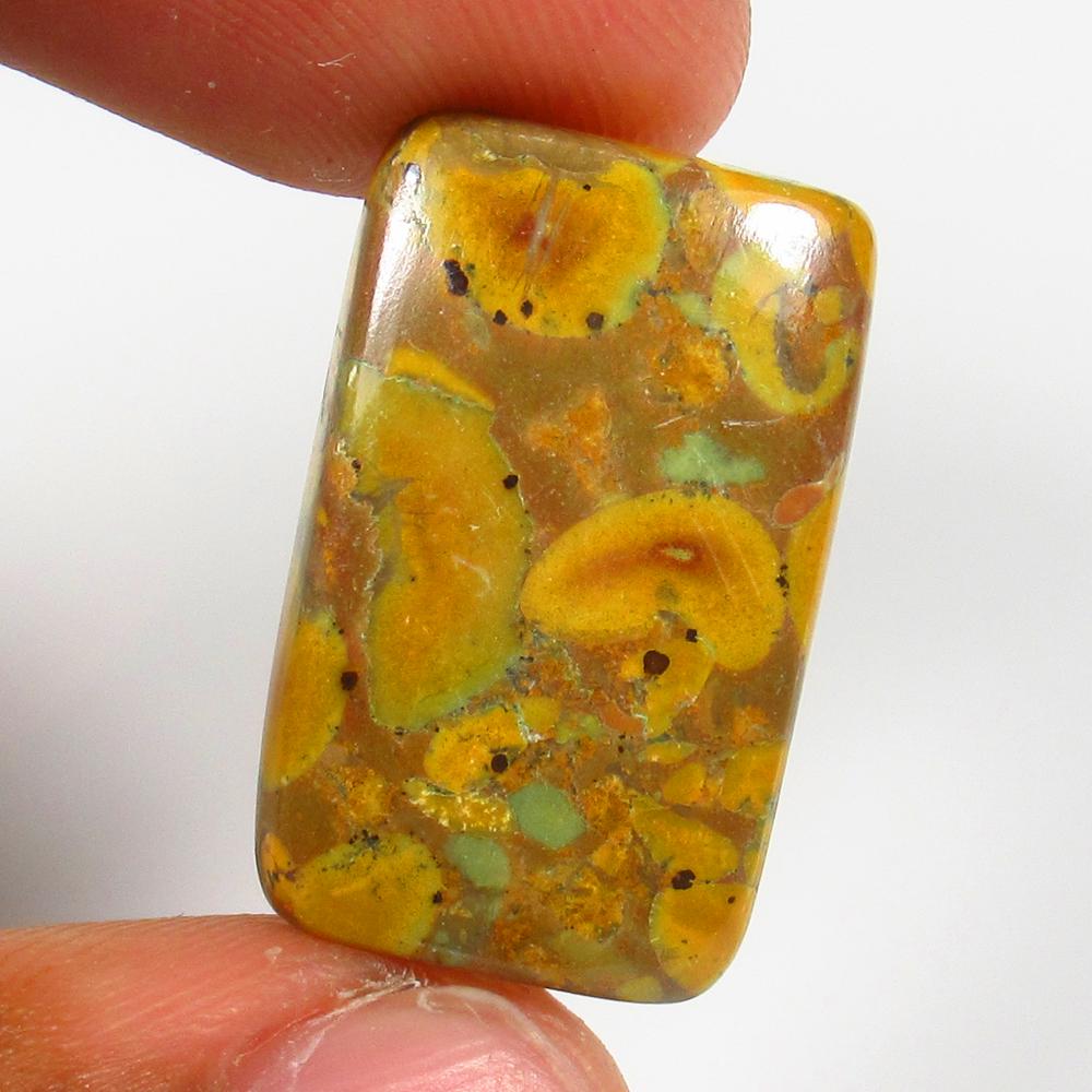 Natural Jasper Quartz - 18.00 Ct: No Reserve! Title: Natural Jasper Quartz - 18.00 Ct Origin: Brazil Weight: 18 Size/Dimensions: 24.0 x 15.0 x 5.0 mm Additional Information: Pieces : 1 No's / Shape : Rectangle Cabochon / Color : Yello