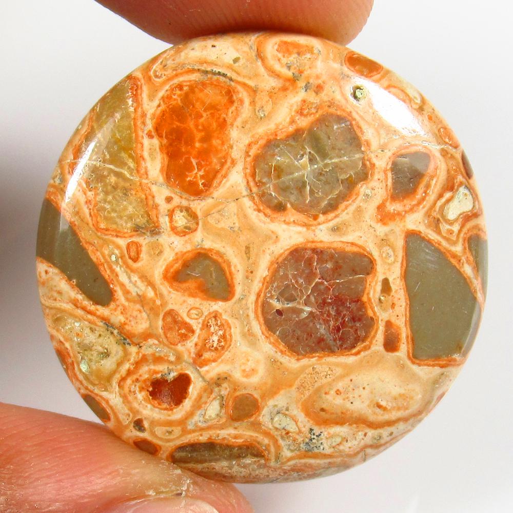 Natural Jasper Quartz - 35.59 Ct: No Reserve! Title: Natural Jasper Quartz - 35.59 Ct Origin: Brazil Weight: 35.59 Size/Dimensions: 30.0 x 30.0 x 5.3 mm Additional Information: Pieces : 1 No's / Shape : Round Cabochon / Color : Orange