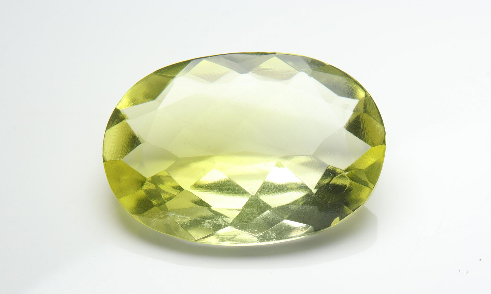 33.56 cts Natural Lemon Quartz: No Reserve! Title: 33.56 cts Natural Lemon Quartz Additional Information: Gemstone: Natural Lemon Quartz Origin: Africa Weight : 33.56 carats Measurements: 28x20 mm Shape / Cut : Oval Cushion Cut Colo