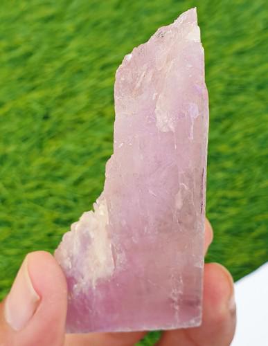 Natural & Unheated~ Purple Pink Kunzite Rough: Title: Natural & Unheated~ Purple Pink Kunzite RoughPurple Pink Gemstone Type: Rough Carat Weights: 291.55 Cts Size/Dimensions: 73x32x15 mm Reserve: $50.00 Shipping: Domestic: Flat-rate of $15.00 to