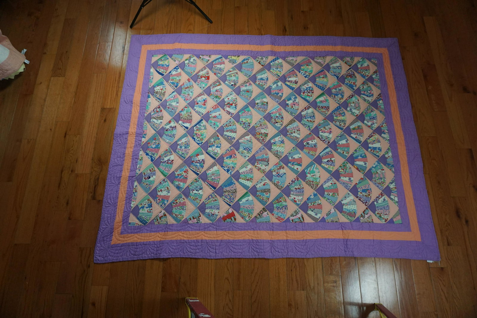 Grandmother's Fan: Title: Grandmother's Fan Date/Period: c. 1935 blocks, c. 1970 bordered/finished Dimension: 100x76 Materials: Cotton fabrics, vintage and new. Cotton thread. Polyester batting. Provenance: Fans with la