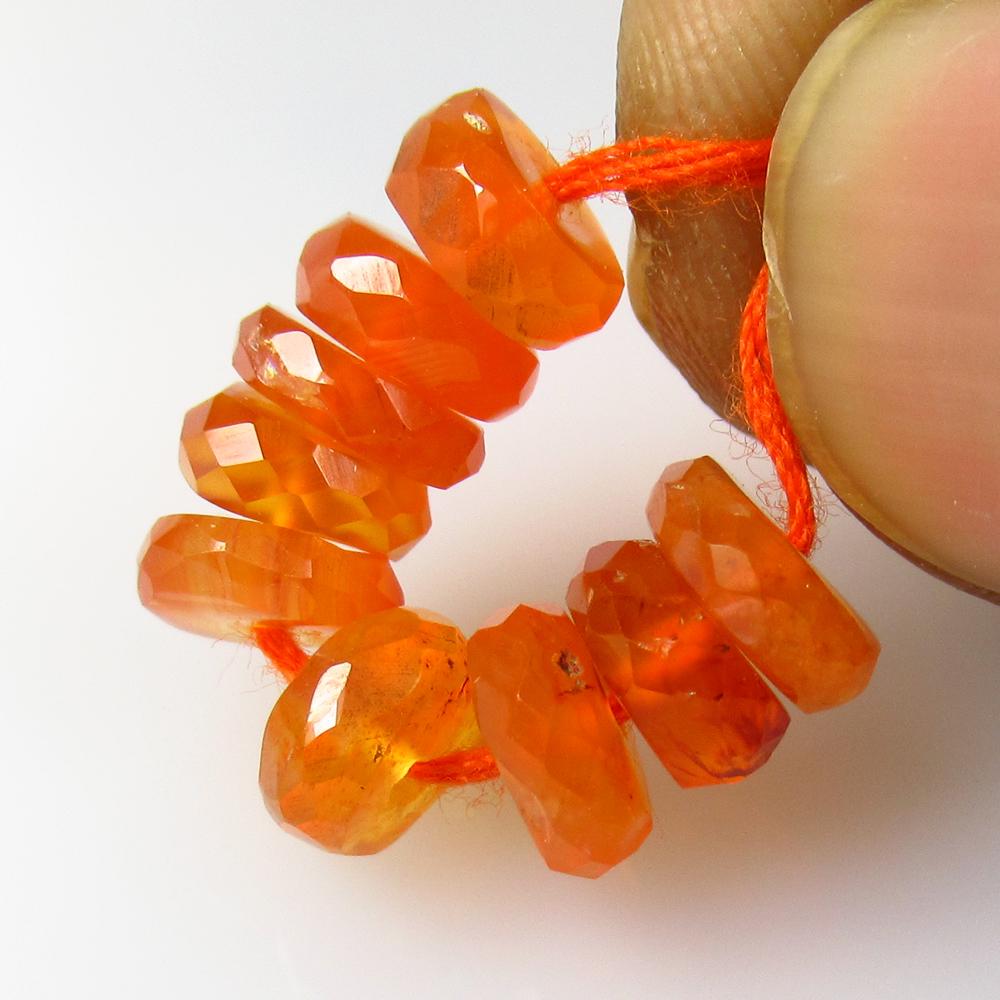 Natural Carnelian Beads - 7.72 Ct: No Reserve! Title: Natural Carnelian Beads - 7.72 Ct Origin: Brazil Weight: 7.72 Size/Dimensions: 6.1 - 6.6 mm Additional Information: Pieces : 9 No's / Shape : Drilled Round Beads / Color : Orange / 