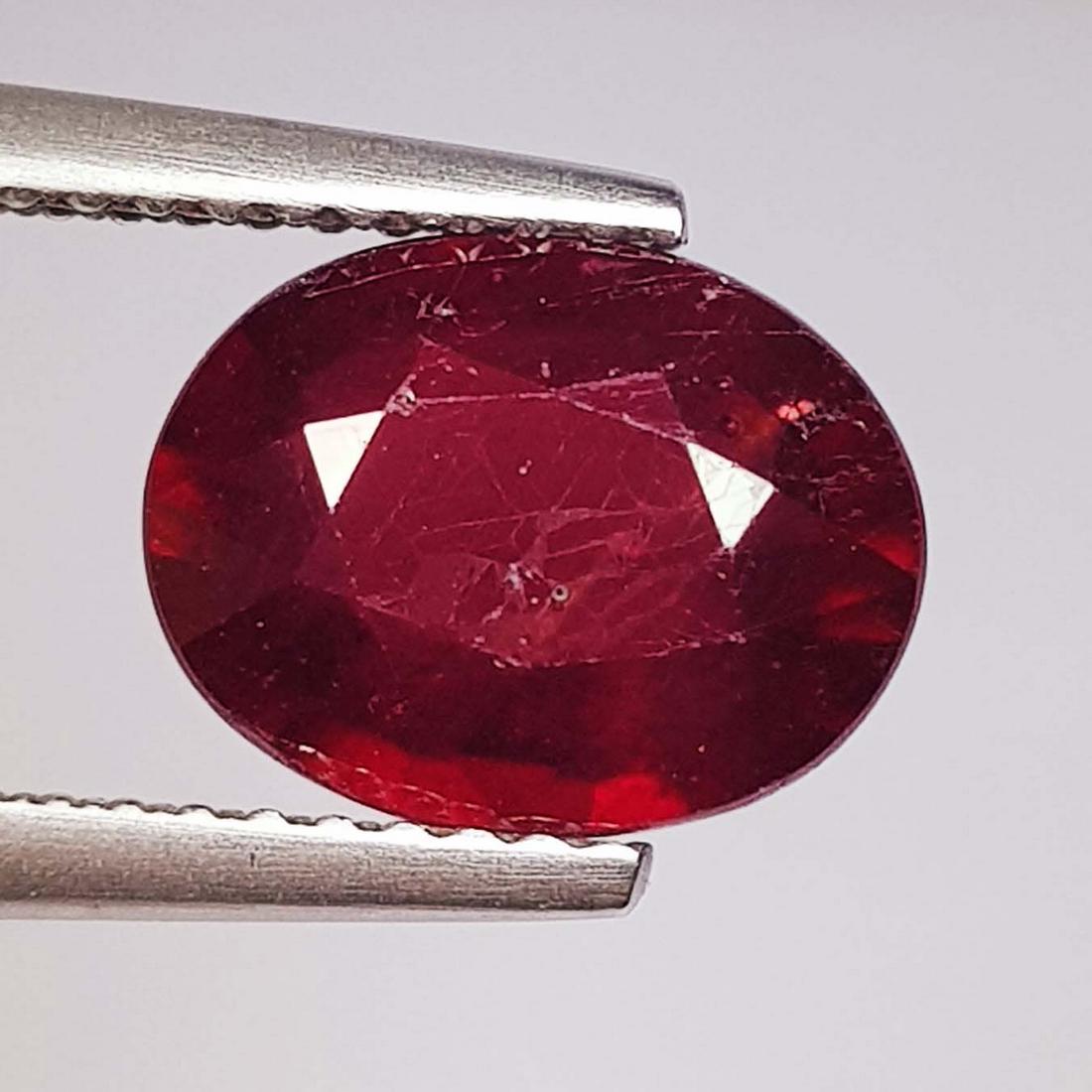 3.15 Ctz Top Quality Pinkish Red Natural Ruby: No Reserve! Title: 3.15 Ctz Top Quality Pinkish Red Natural Ruby Color/Clarity: Pinkish Red / VVS/VS Gemstones: Ruby Carat Weights: 3.15 Size/Dimensions: 9.90 x 7.60 x 4.40 Additional Info: Oval / Bur