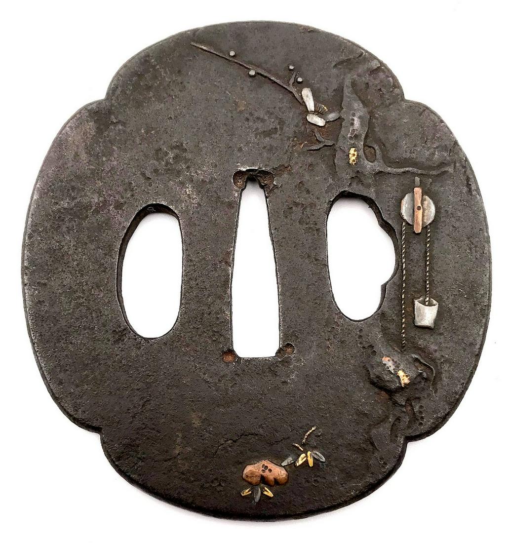 Iron tsuba with a well and a bucket motif (1 of 2)