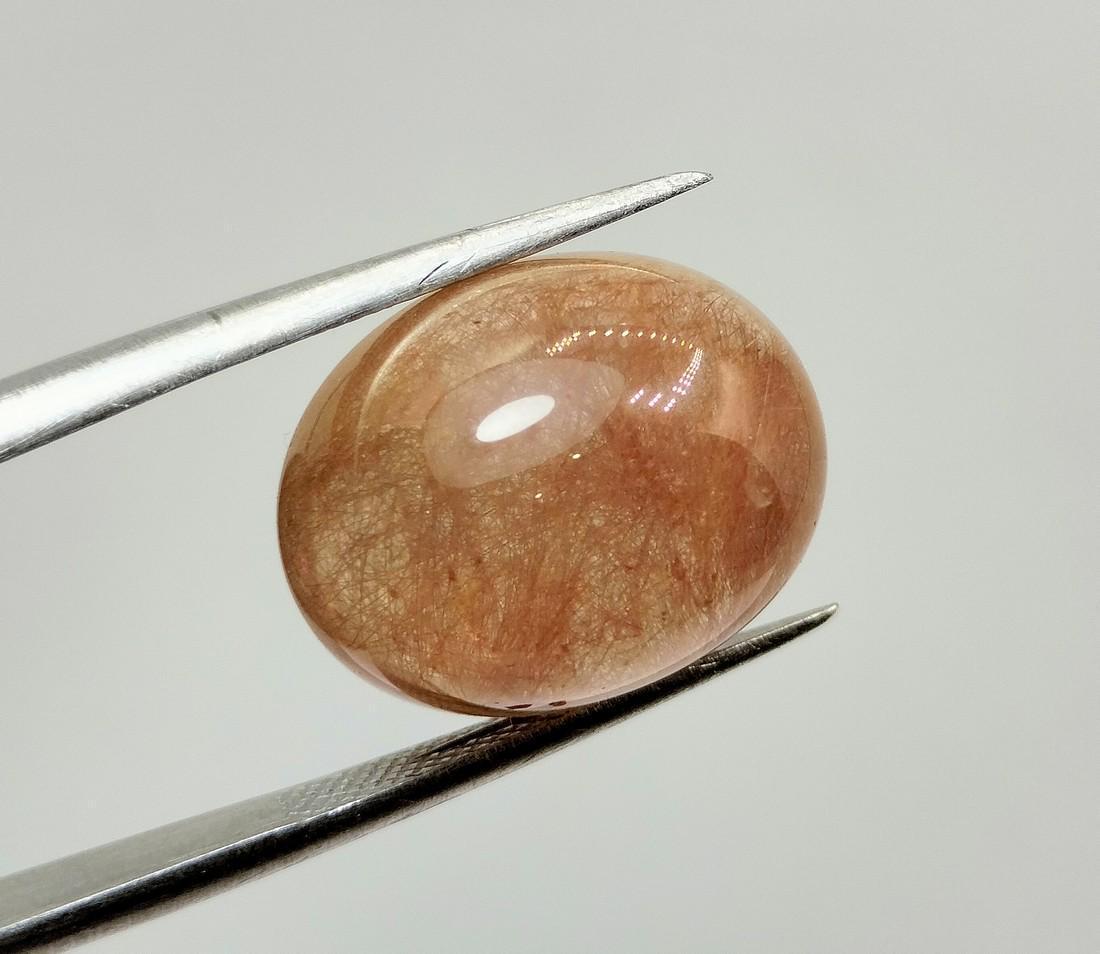 15.95 Carats Stunning Natural Quartz With Rutile Inclusion Cab: Title: 15.95 Carats Stunning Natural Quartz With Rutile Inclusion Cab Carat Weights: 15.95 Carat Size/Dimensions: 15x11x8 mm Origin: Pakistan Reserve: $25.00 Shipping: Domestic: Flat-rate of $10.00 to