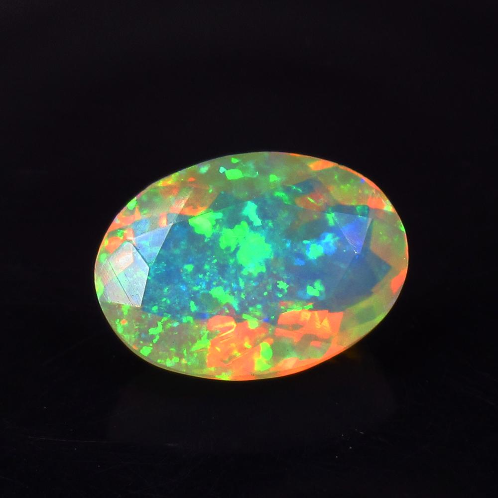 3.30 Ctw Natural Ethiopian Multi-Color Opal Oval Cut: Title: 3.30 Ctw Natural Ethiopian Multi-Color Opal Oval Cut Stone Clarity: Transparent Gemstones: Natural Opal Carat Weights: 3.3 Size/Dimensions: 13.40 x 9.70 x 6.60 mm Additional Information: Shape 