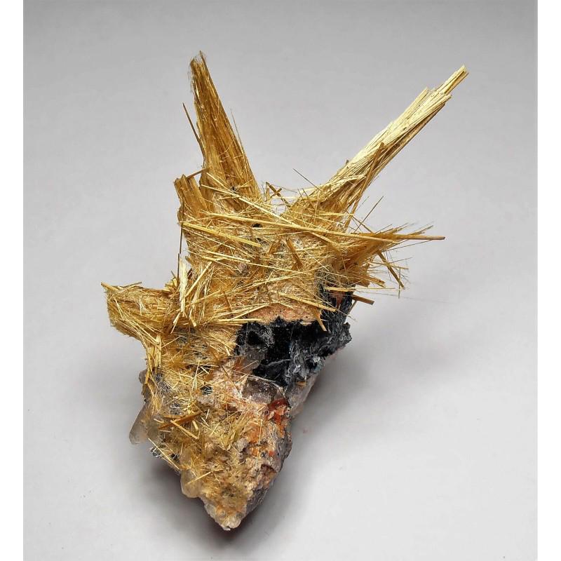 Mineral hematite crystal golden rutile cluster specimen: MATERIAL: Hematite crystal CONDITION: Very good condition Size: 2,1 inch (52 mm) x 1,1 inch (27 mm) x 0,8 inch (18 mm) Origin: Novo Horozonte, Bahia, Brazil. Hematite has been considered a sacred ston