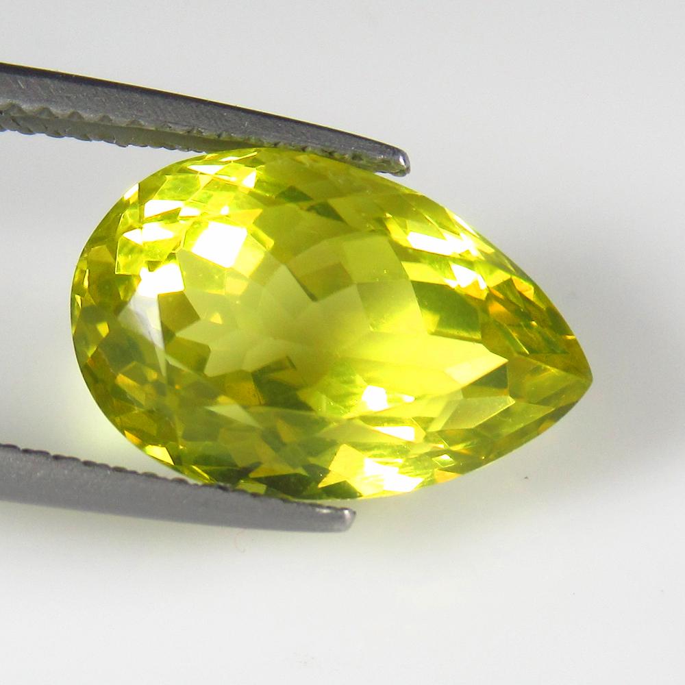 Natural Lemon Quartz - 8.19 Ct: No Reserve! Title: Natural Lemon Quartz - 8.19 Ct Origin: Africa Weight: 8.19 Size/Dimensions: 15.00 x 10.00 x 9.50 mm Additional Information: Pieces : 1 No's / Shape : Pear Cut / Color : Greenish Yel
