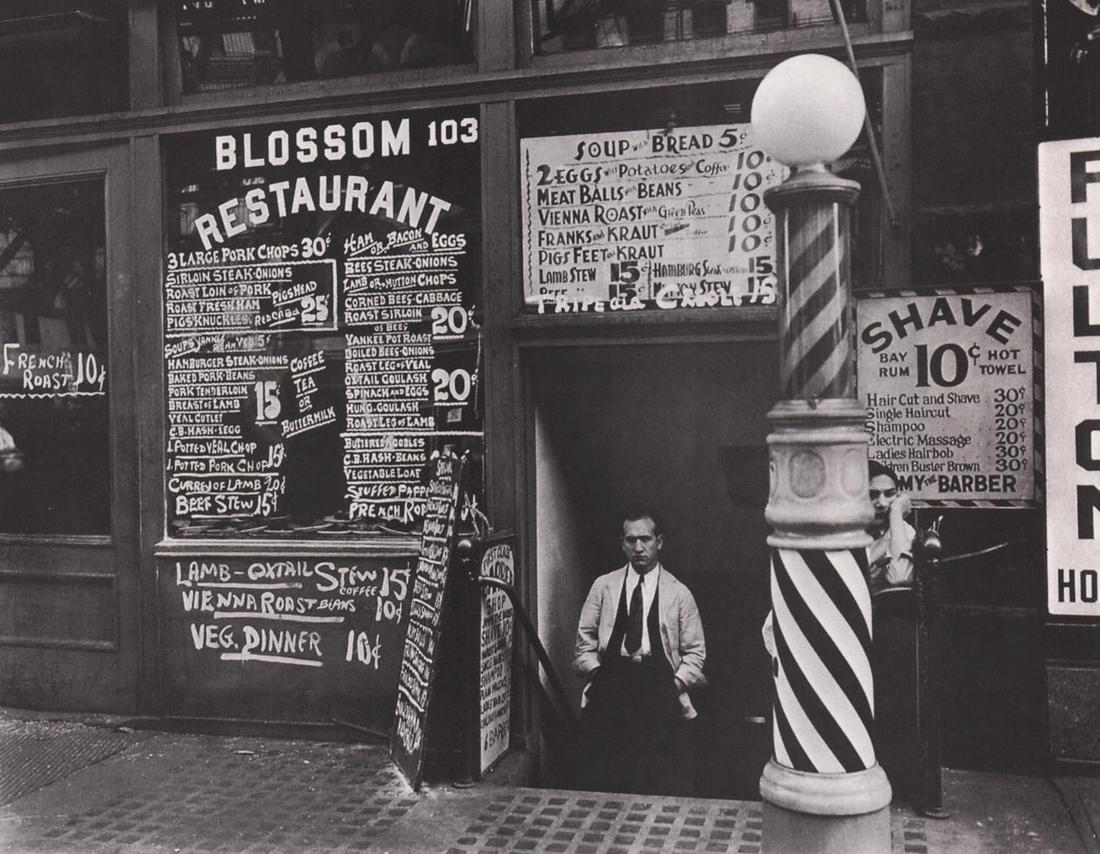 BERENICE ABBOTT- Blossom Restaurant, 103 Bowery, 1935: Artist: BERENICE ABBOT Print Title: Blossom Restaurant, 103 Bowery, 1935 Medium: Photo-lithograph Printed in: the US, 2010s Image Size: approx. 6.5 x 9” Berenice Abbott (1898 – 1991),was a