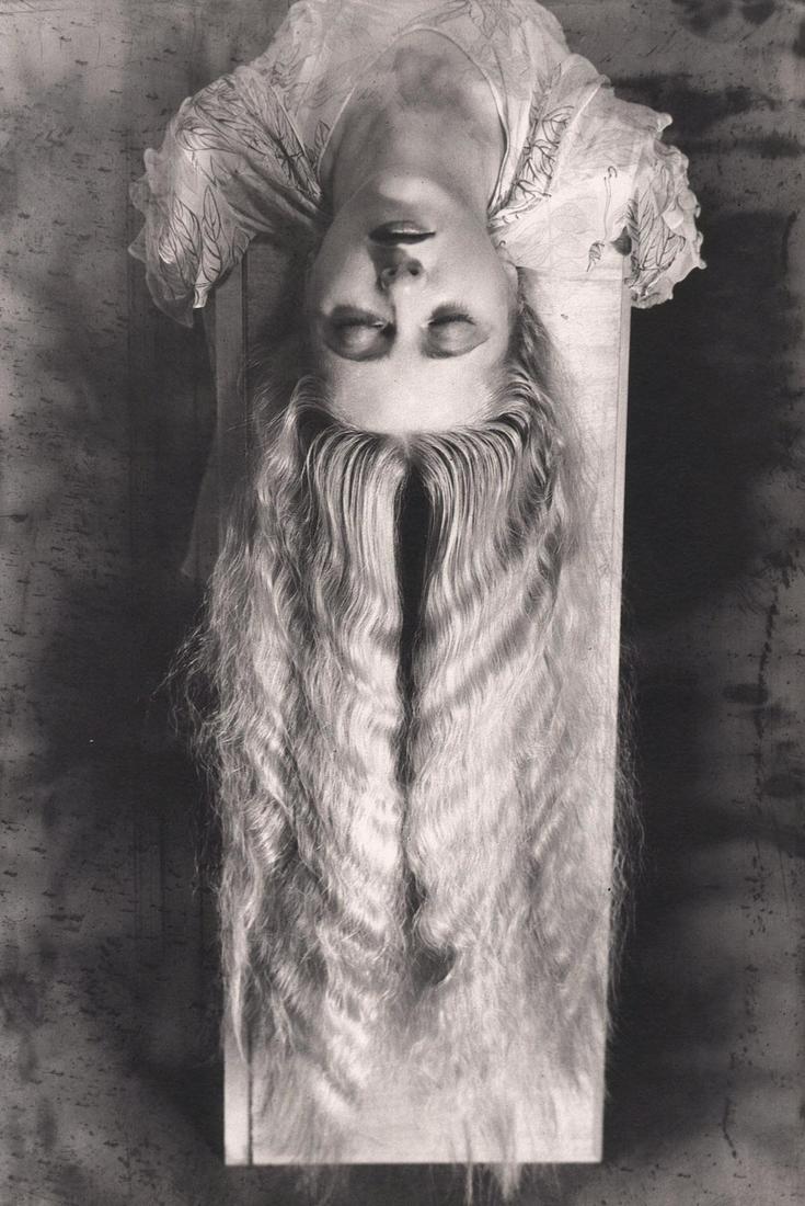 MAN RAY - Femme aux Lons Cheveux, 1929: Artist: MAN RAY Print Title: Femme aux Lons Cheveux, 1929 Medium: Duotone Photolithograph Printed Printed 1990’s in Italy Image size (inches) approx. 11.5 x 7.5” Man Ray was an American vi