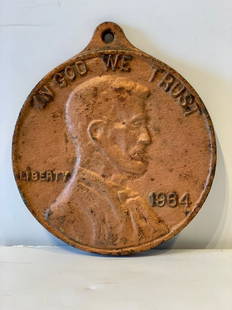 Cast Iron Lincoln Penny Plaque 1964: Title: Cast Iron Lincoln Penny Plaque 1964Dimension: 5 1/2 in x 5 inCirca: Dated 1964Additional Information: Graphic, deeply cast form. Good patina. Shipping:Domestic: Flat-rate of $28.00 to