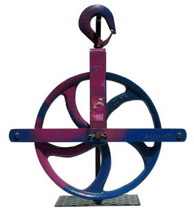 Decorative colorful, large industrial cast iron pulley: A colorful, large industrial cast iron pulley with older working overpaint. This is in excellent condition, likely from the last quarter of the 20th c. It is mounted on contemporary metal display