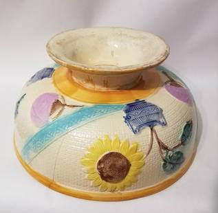 Majolica punchbowl with sunflowers: 13" diameter. Condition as shown, I can recommend a restorer. In perfect condition this is an 800. piece. C 1860. Shipping:Domestic: Flat-rate of $20.00 to anywhere within the contiguous