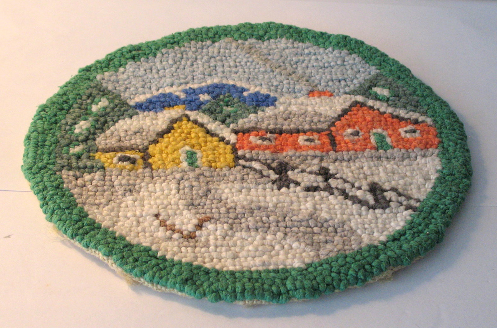 Vintage New England hooked table mat. (1 of 3)