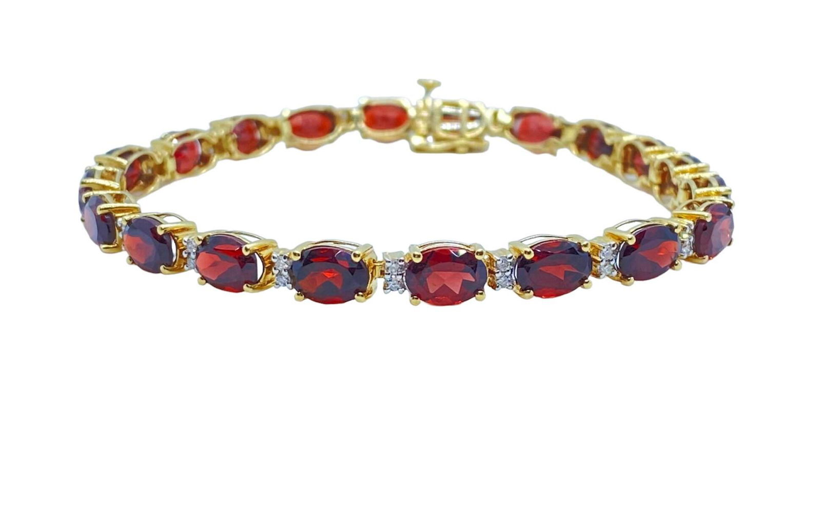 classic oval garnet and diamond tennis bracelet in 14k yellow gold (1 of 10)