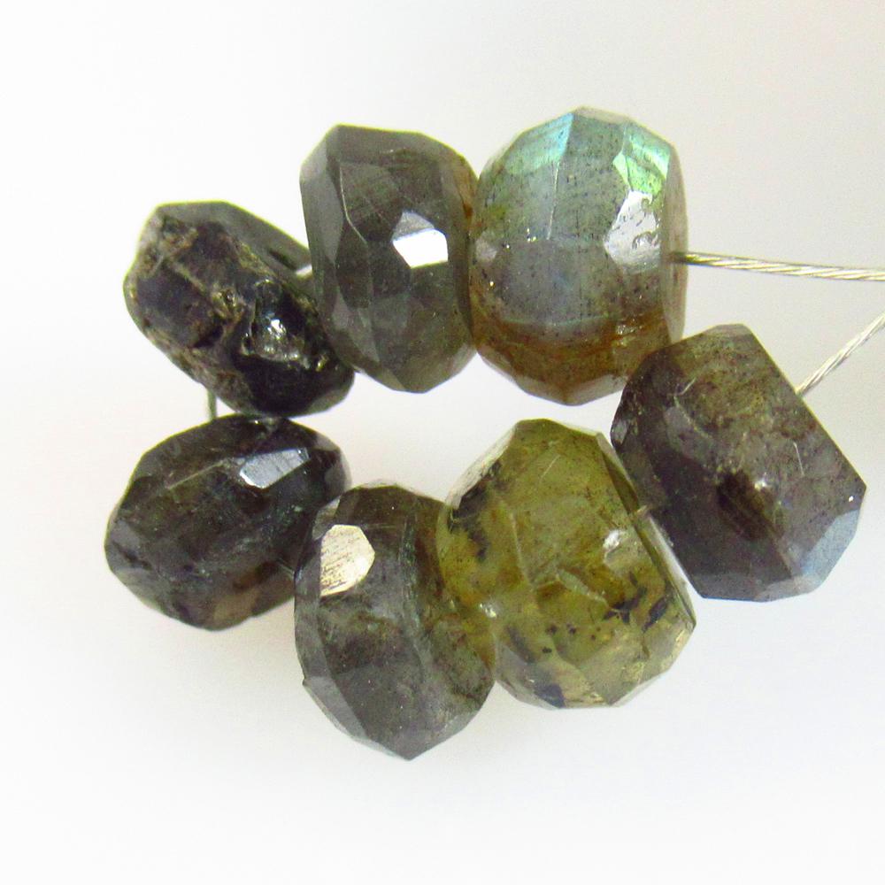 11.00 Ctw Natural 7 Labradorite Round Beads: No Reserve! Title: 11.00 Ctw Natural 7 Labradorite Round Beads Stone Clarity: Transparent Gemstones: Natural Labradorite Beads Carat Weights: 11 Size/Dimensions: 6.50 - 7.00 mm / 7 Pc's Additional Inf