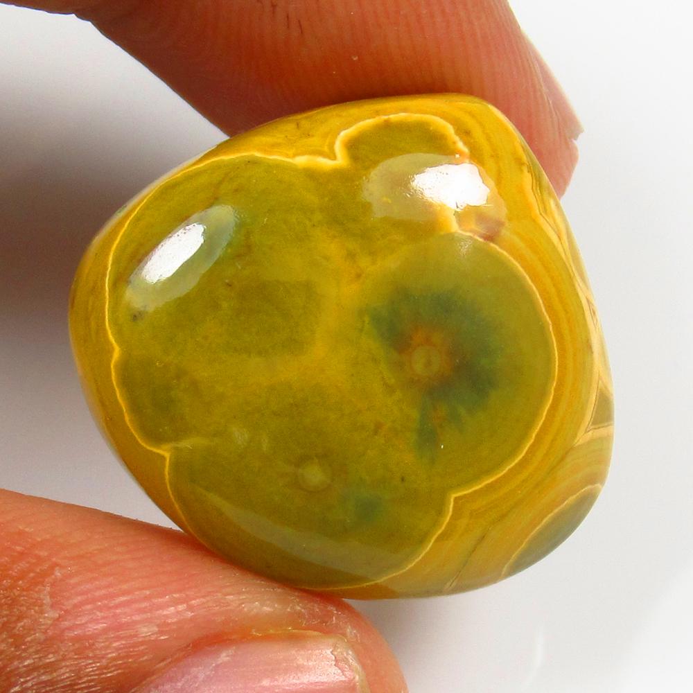 Natural Jasper Quartz - 27.00 Ct: No Reserve! Title: Natural Jasper Quartz - 27.00 Ct Origin: Brazil Weight: 27 Size/Dimensions: 25.0 x 23.0 x 7.5 mm Additional Information: Pieces : 1 No's / Shape : Pear Cabochon / Color : Yellow / C