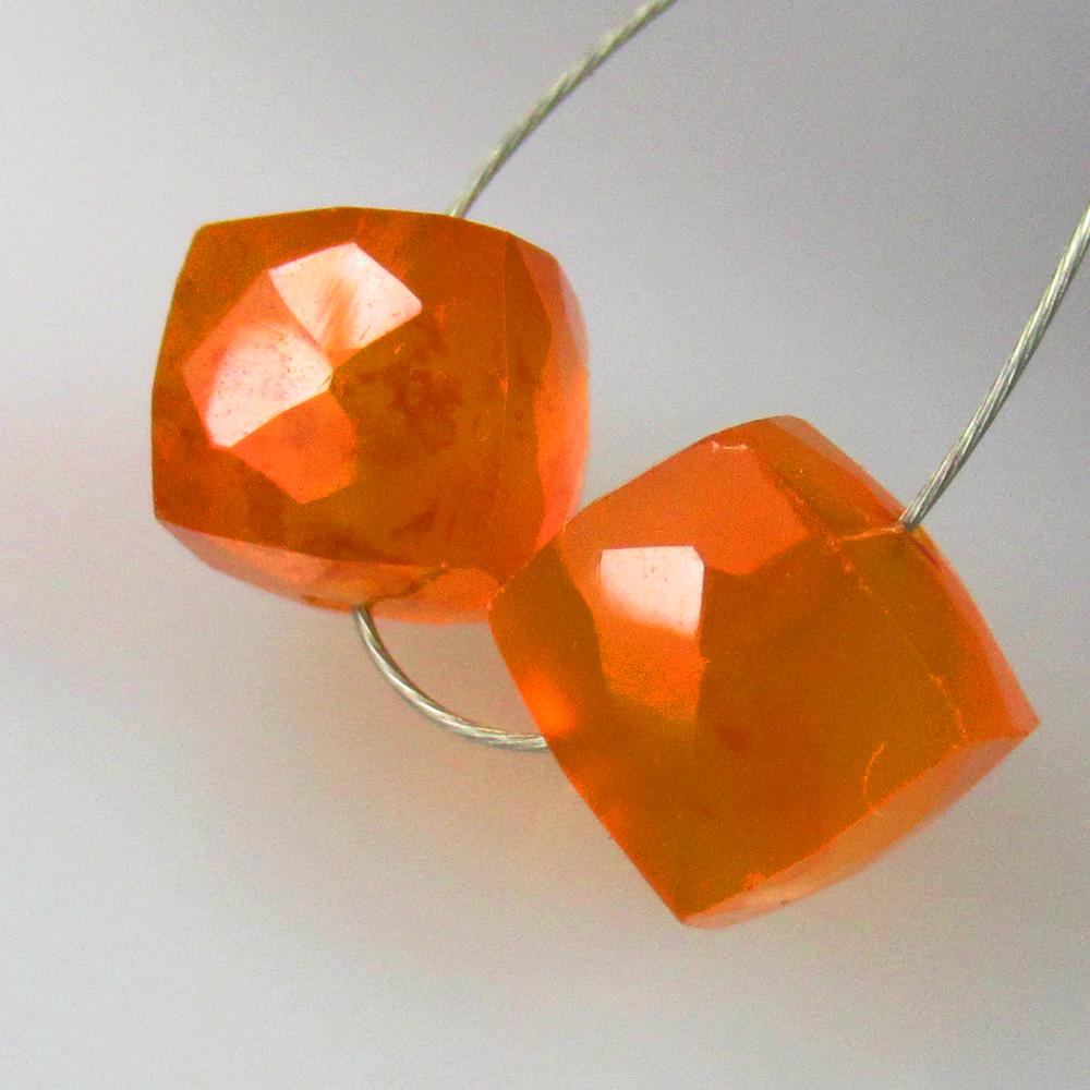 5.45 Ctw Natural 2 Drilled Orange Carnelian Square Beads: No Reserve! Title: 5.45 Ctw Natural 2 Drilled Orange Carnelian Square Beads Stone Clarity: Semi-Transparent Gemstones: Natural Carnelian Beads Carat Weights: 5.45 Size/Dimensions: 6.50 x 6.40 x 6.40 m