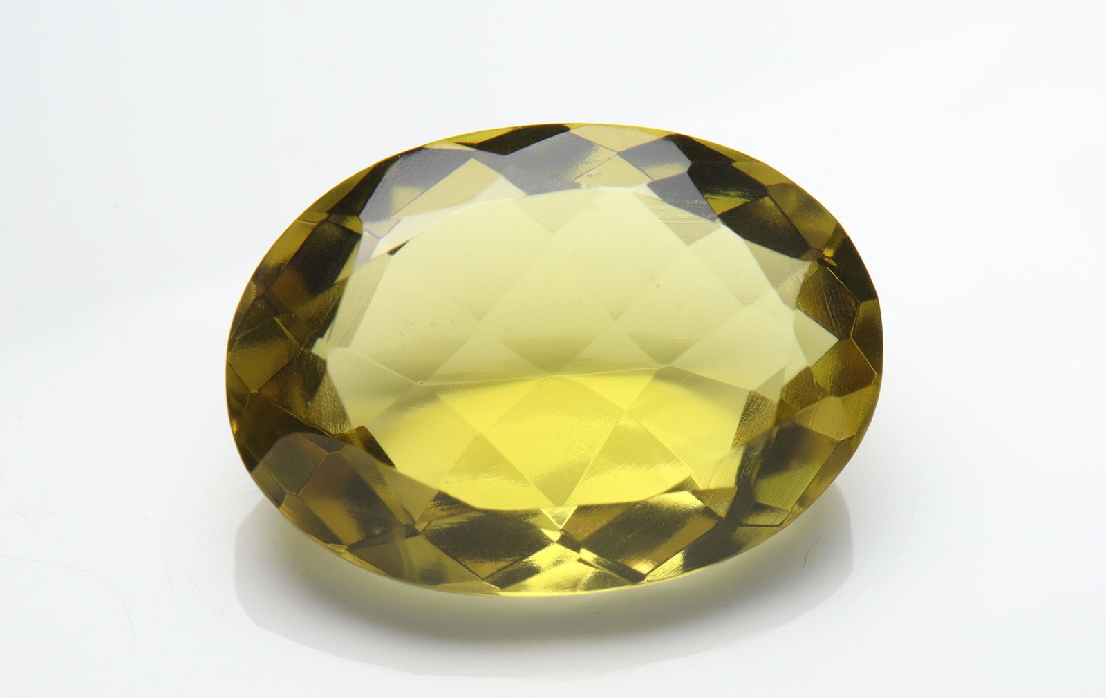 23.94 cts Natural Lemon Quartz: No Reserve! Title: 23.94 cts Natural Lemon Quartz Additional Information: Gemstone: Natural Lemon Quartz Origin: Africa Weight : 23.94 carats Measurements: 24x18 mm Shape / Cut : Oval Cushion Cut Colo