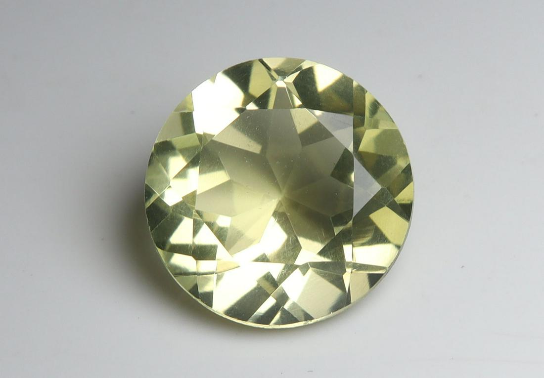 3.79 Cts Natural Lemon Quartz: No Reserve! Title: 3.79 Cts Natural Lemon Quartz Additional Information: Gemstone : Natural LemonQuartz Shape and cut : Round Cut Origin : Africa Weight : 3.79 carats Measurements : 11x11 mm Color : Y
