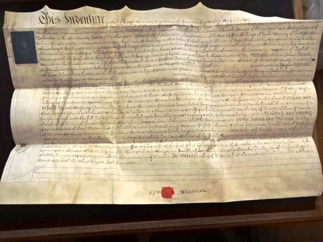 1777 English Vellum Indenture Lincoln Farm: Handwritten English vellum indenture dated 1777 during the reign of George III being the conveyance of a farm at Gosbarten in the county of Lincoln. Nicely penned with revenue and tax stamp, and red w