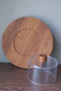 Footed Danish Design Teak Cheese Server and Dome: This is a great way to display your cheese at your next event. The dome is nestled inside and there is room on the outside to place your crackers in a circular pattern around the center. This server