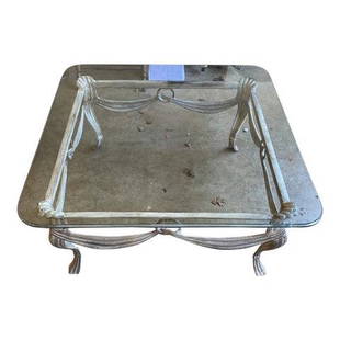 1970s White Metal Coffee Table With Glass Top: Beautiful metal coffee table with glass top. Has rounded corners and edges which adds elegance to the piece. Perfect for any space and for the interior designer.DIMENSIONS: 39.5"W x 39.5"D x