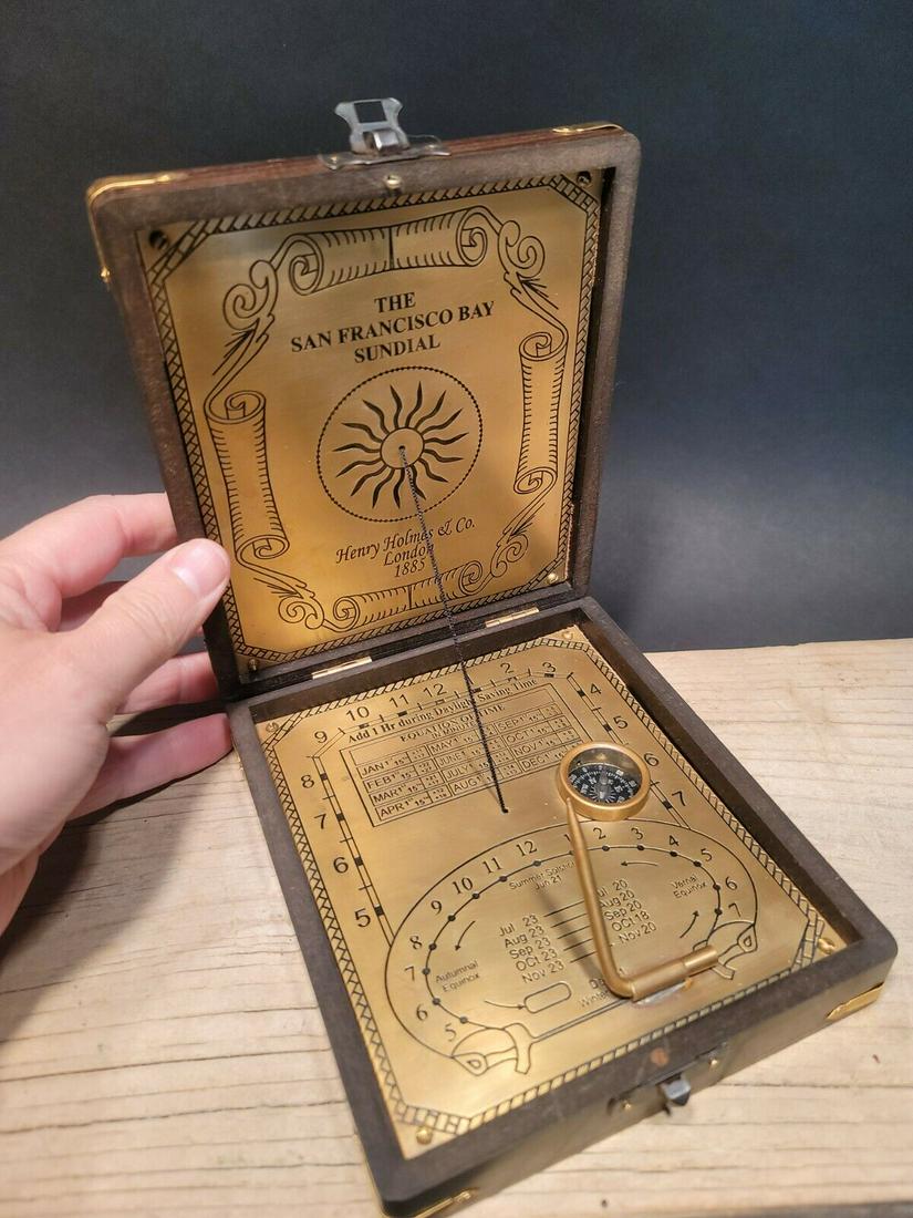 Wood Sundial Henry Holmes Compass Instrument: 5 1/2" x 6 1/2 x 1 1/2" Such a neat reproduction antique compass. All harwood and engraved brass. Such a neat functional instrument! Reserve: $45.00 Shipping: Domestic: Flat-rate of $11.00 to anywhere