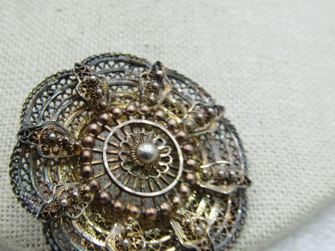 Vintage Alice Caviness Sterling Filigree Brooch, 1.75", Gold wash: Vintage Alice Caviness Sterling Filigree Brooch, Gold Wash 1.75", Southwestern appeal, Weight is appx. 11.88 grams. Appx. Age is late 1940's. This is a scalloped edges filigree brooch with a blossom d