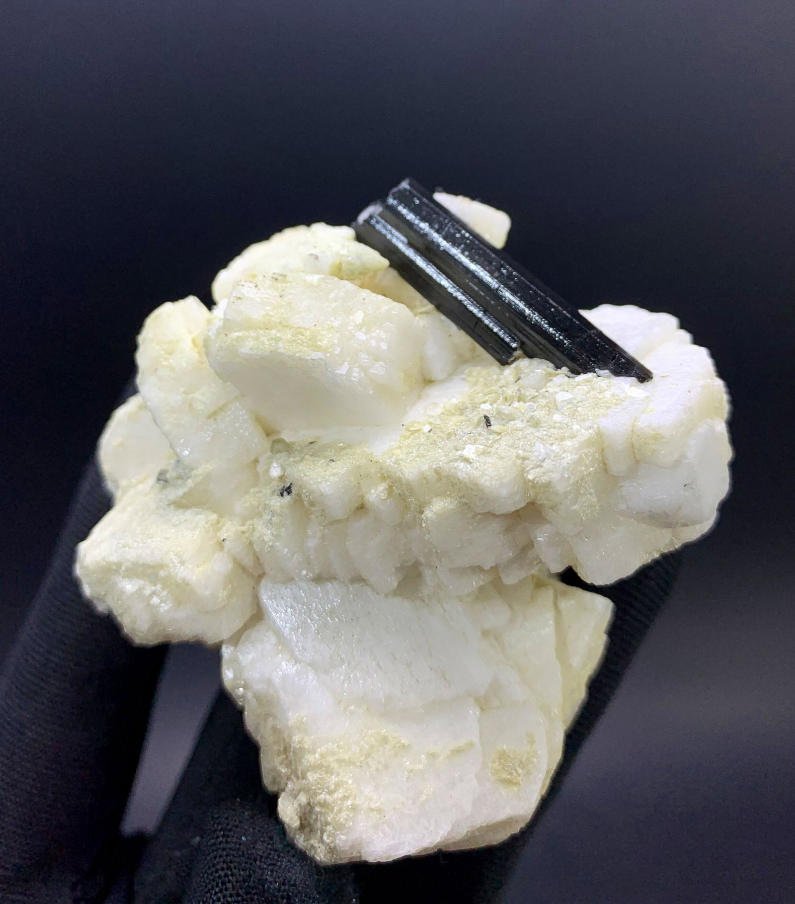 Black Tourmaline With White Feldsper from Skardu Pakistan 100 Gram: Materials: Gem type: Tourmaline Description Black Tourmaline With White Feldsper from Skardu Pakistan 100 Gram Weight : 100 gram Size : 65*60*35 mm Origin : Pakistan Treatment : Natural DHL Shipphing 