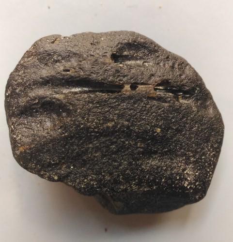 PHILIPPINITE TEKTITE - FROM METEORITE IMPACT: Title: PHILIPPINITE TEKTITE - FROM METEORITE IMPACT Origin: Paracale, Camarines Norte, Luzon, Philippines Size: 3.8x2.5x1.5 cm / 18 gram smooth rounded philippinite tektite with some striated grooves