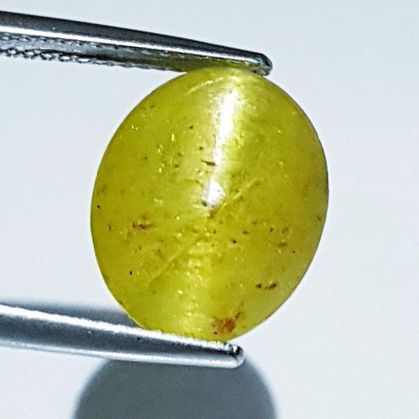 23.04 ctz"Rare & Big Sized" Stunning Green Gold Apatite Cat's Eye: No Reserve! Title:23.04 ctz"Rare & Big Sized" Stunning Green Gold Apatite Cat's Eye Color/Clarity:Green Gold / Transparant Gemstones:Apatite Cat's Eye Carat Weights:23.04 Size/Dimensions:20.30 x 16.00