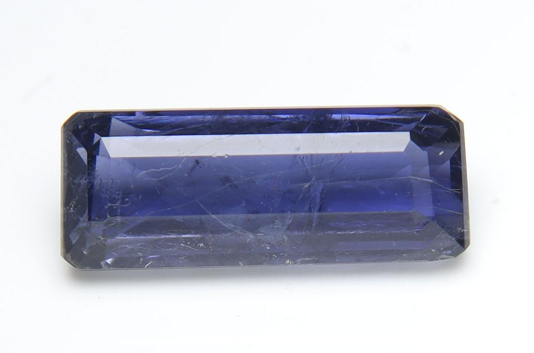 3.66 cts Natural Iolite: No Reserve! Title: 3.66 cts Natural Iolite Additional Information: Gemstone : Natural Iolite Shape and cut : Rectengular Cut Weight : 3.66 carats Measurements : 15x6 mm , Color : Violite Transparency