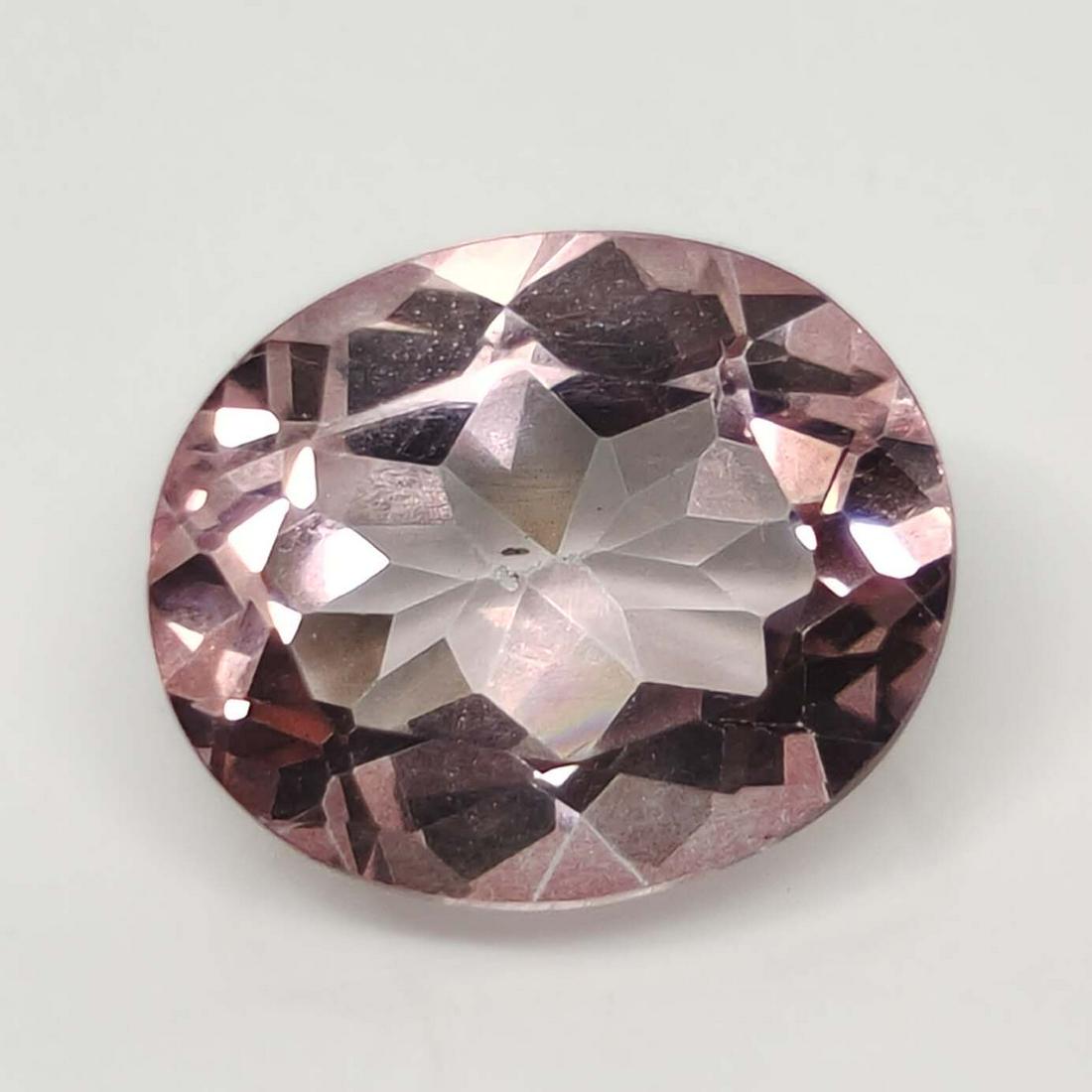 5.75 ct Rare Natural Morganite Mystic Quartz: No Reserve! Title: 5.75 ct Rare Natural Morganite Mystic Quartz Additional Information: Gemstones: Natural Mystic Quartz Carat Weights: 5.75 ct Size/Dimensions: 12 X 10 mm Treatment: Coated Materials