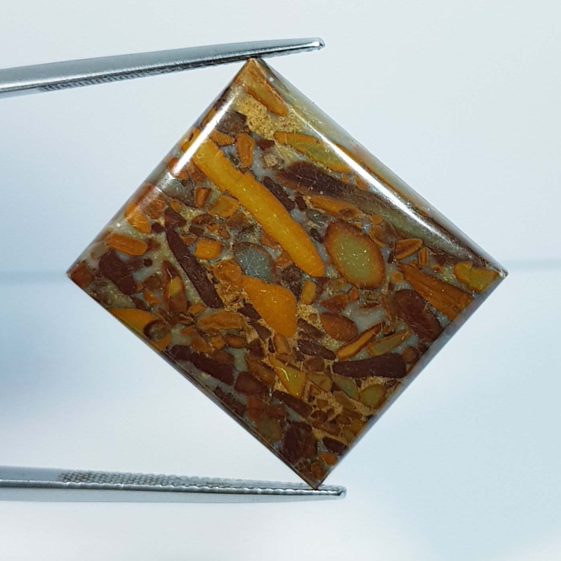 34.09 Ctz Natural Ajebolite Jasper: No Reserve! Title:34.09 Ctz Natural Ajebolite Jasper Color/Clarity:Brownish Yellow / Opaque Gemstones:Jasper Carat Weights:34.09 Size/Dimensions:25.66 x 23.04 x 5.50 Additional Information:Octagon / A