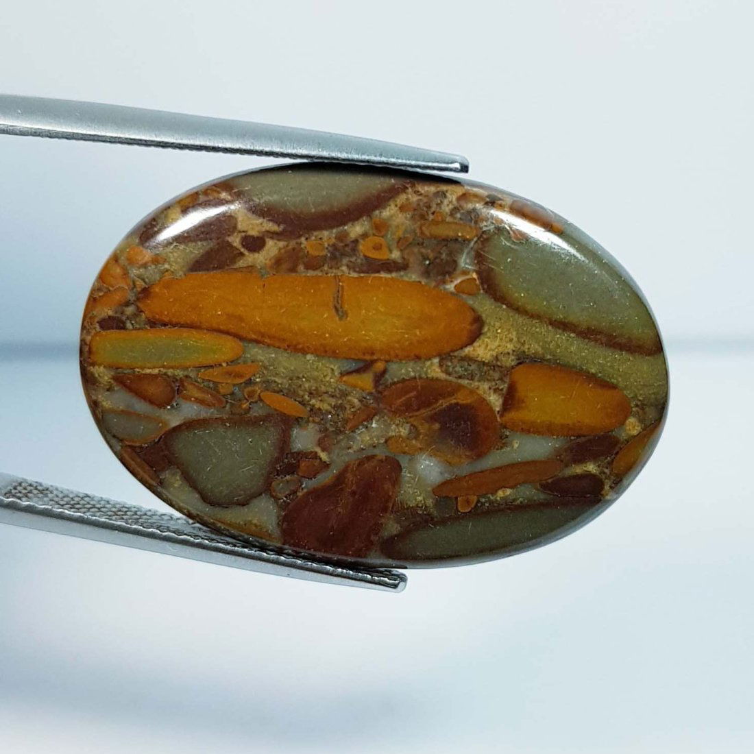 22.16 Ctz Natural Ajebolite Jasper: No Reserve! Title:22.16 Ctz Natural Ajebolite Jasper Color/Clarity:Brownish Yellow / Opaque Gemstones:Jasper Carat Weights:22.16 Size/Dimensions:30.50 x 20.70 x 4.00 Additional Information:Oval / Afri