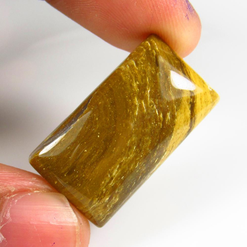 Natural Jasper Quartz - 25.73 Ct: No Reserve! Title: Natural Jasper Quartz - 25.73 Ct Origin: Brazil Weight: 25.73 Size/Dimensions: 28.0 x 16.0 x 6.0 mm Additional Information: Pieces : 1 No's / Shape : Rectangle Cabochon / Color : Ye