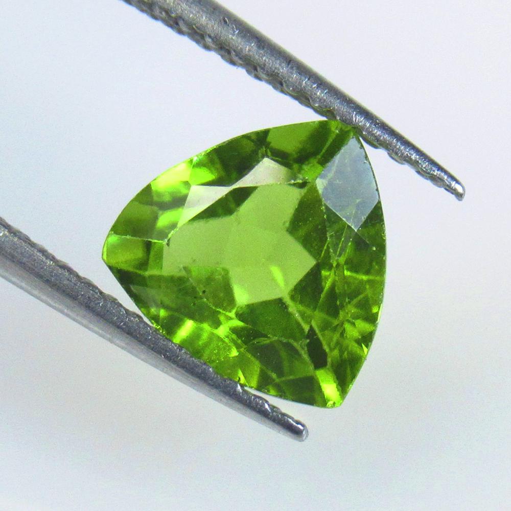 1.87 Ctw Natural Pakistan Peridot Trillion Cut: No Reserve! Title: 1.87 Ctw Natural Pakistan Peridot Trillion Cut Stone Clarity: VVS Gemstones: Natural Peridot Carat Weights: 1.87 Size/Dimensions: 7.80 x 7.80 x 4.50 mm Additional Information: Top C