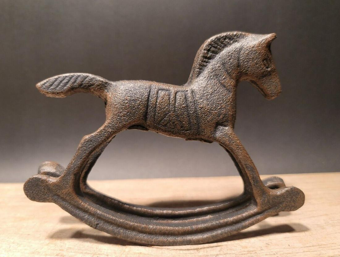 Cast Iron Rocking Horse Toy: 6 1/2" overall length x 5" tall x 1 1/4" wide Nice quality reproduction cast iron. Mostly black slight traces of brown. Great quality display! Reserve: $16.00 Shipping: Domestic: Flat-rate of $10.00 t