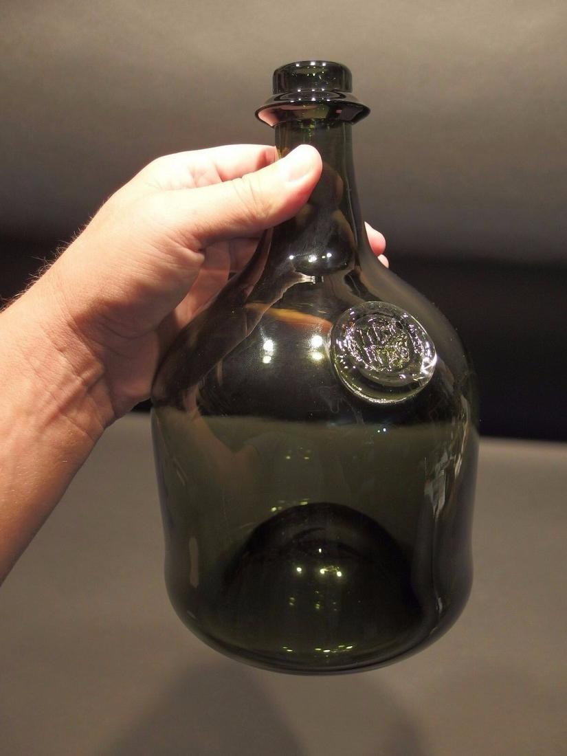 Black Glass Blown Mallet Onion Wine Bottle Green: Description 10" Tall x 6" Wide Great reproduction onion bottle with a polished pontil. See the images the bottom has some scratches and scuffs, no cracks or chips.. Reserve: $40.00 Shipping: Domestic:
