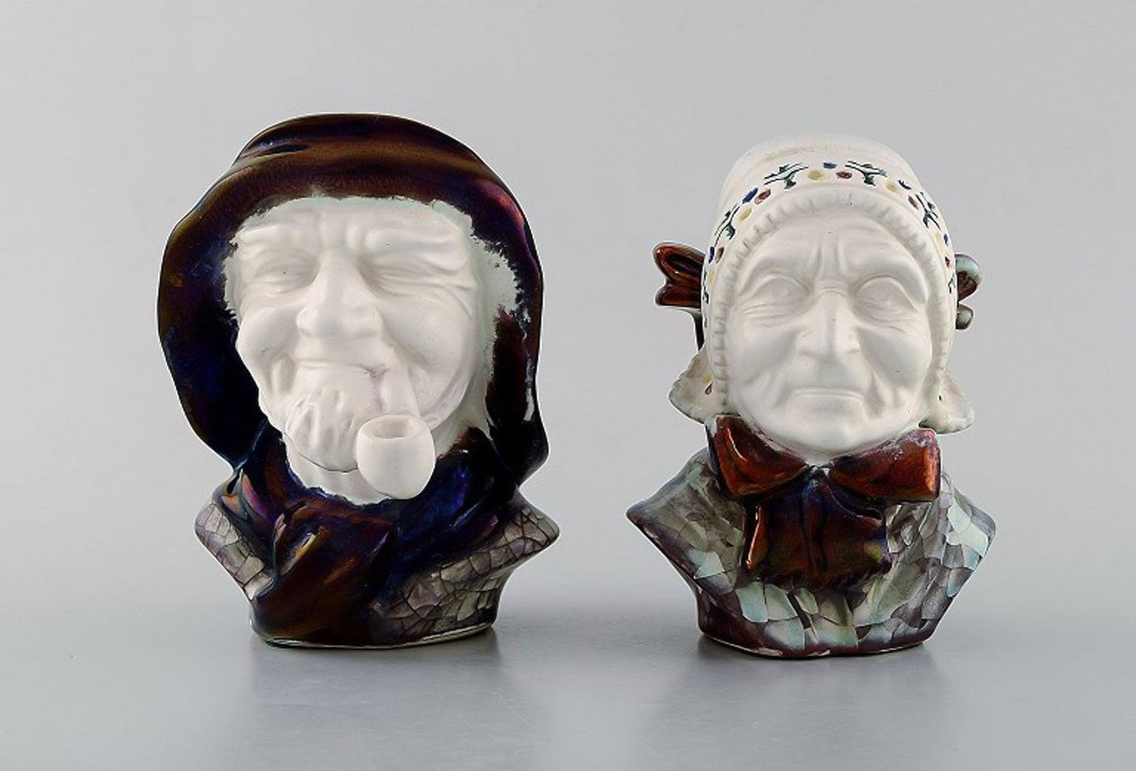 Michael Andersen Ceramics from Bornholm. A pair of heads, national costume, hand painted.: Michael Andersen Ceramics from Bornholm. A pair of heads, national costume, hand painted. Measures: 14,5 x 12,5 cm. Perfect condition. Reserve: $140.00 Shipping: Domestic: Shipping rates are determine