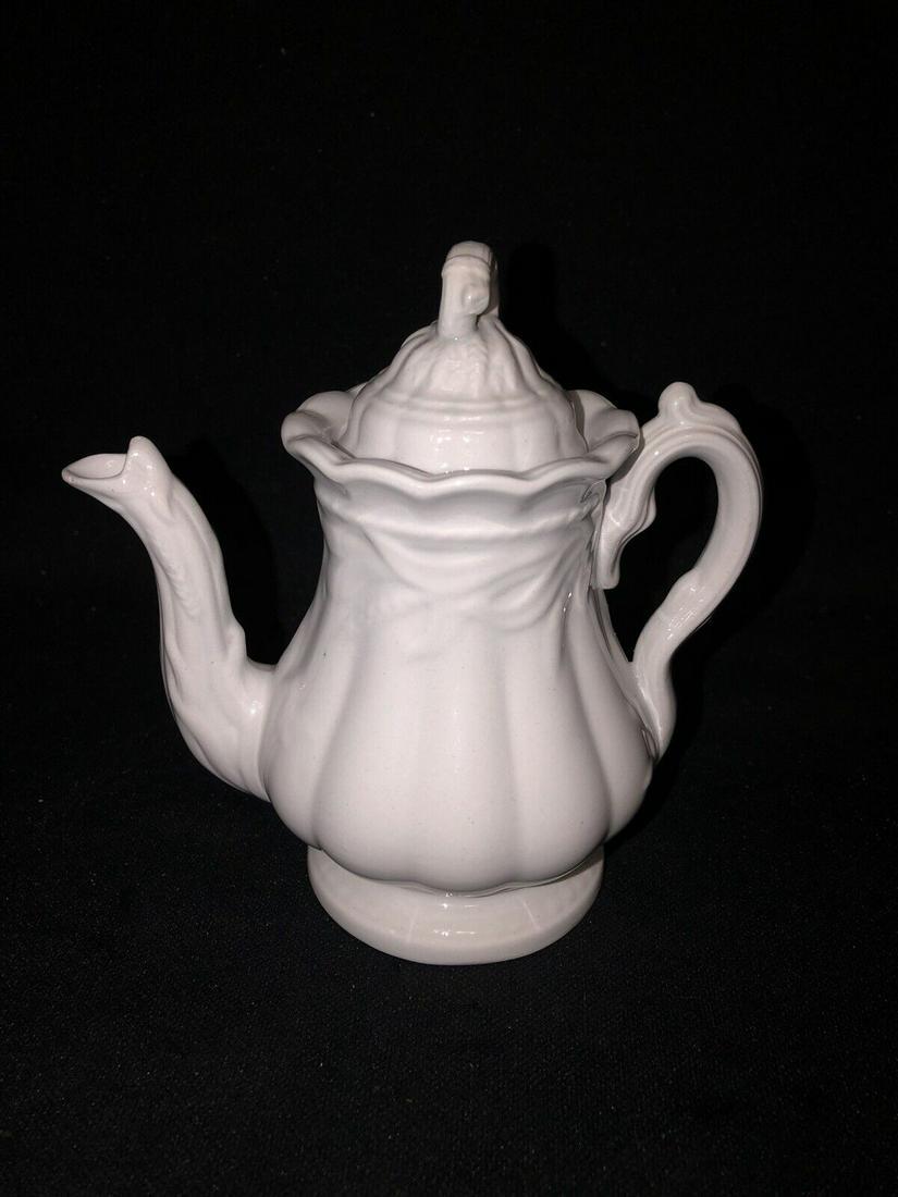 ironstone childs ceres teapot: It measures 5 1/4” x 5 1/4” and is marked. It has several small chips in the lid rim. Otherwise it has no other issues Shipping: Domestic: Flat-rate of $15.00 to anywhere within the contig