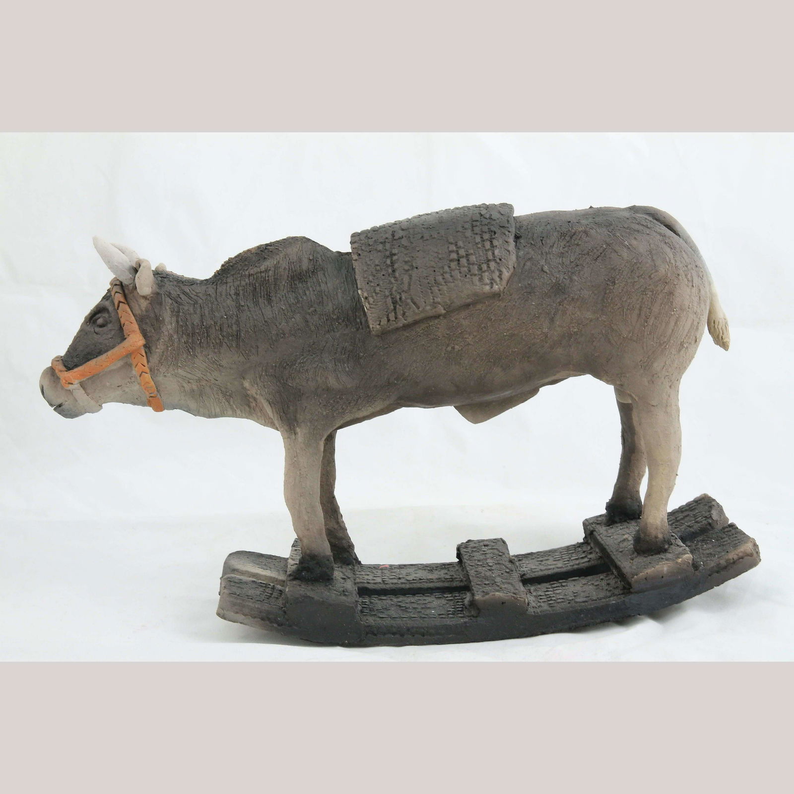 Ceramic/Pottery Rocking Bull Bank Mexican Folk Art Collectible Décor Handmade: No Reserve! Mexican Ceramic "Rocking Bull Bank". Tall- 8 1/2" (measured on highest point). Length- 14 1/2" Wide- 4" This whimsical and collectible figurine was made by an artist in Michoacán. <